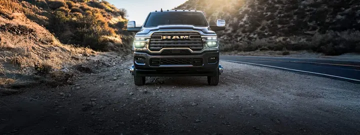 Ram 3500 work truck on a mountain road at first light