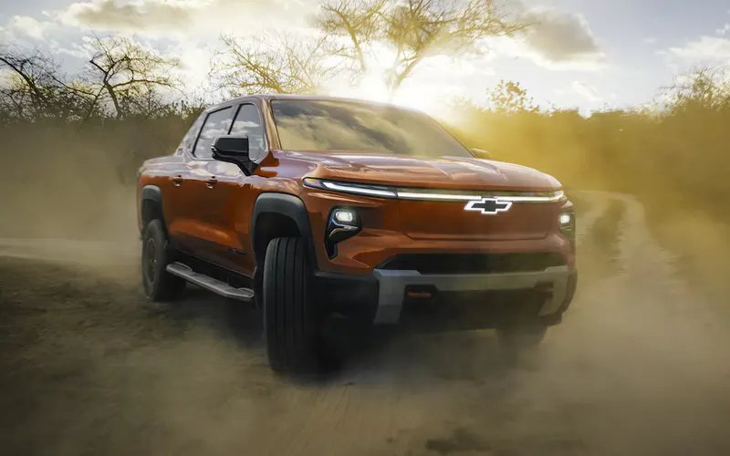 Chevrolet Silverado EV pickup on a dusty dirt road