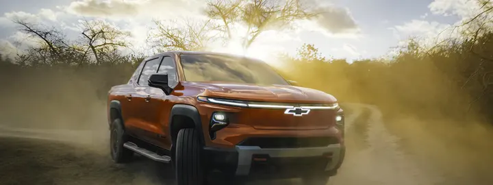 Chevrolet Silverado EV pickup on a dusty dirt road