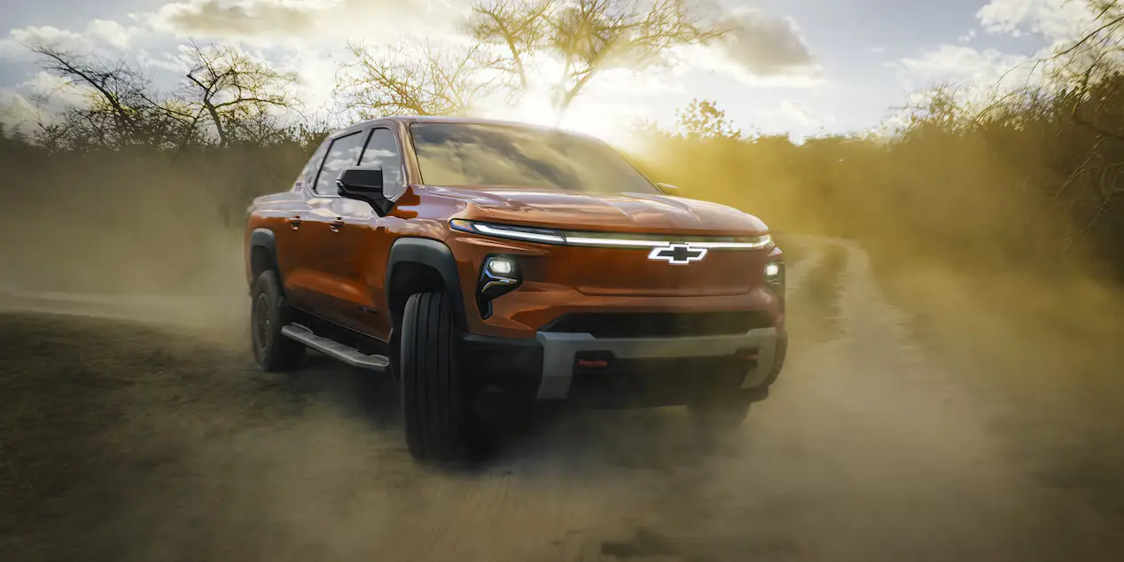 Chevrolet Silverado EV pickup on a dusty dirt road