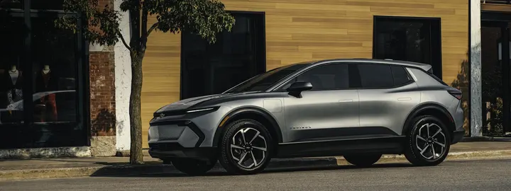 Chevrolet Equinox EV parked on a downtown street