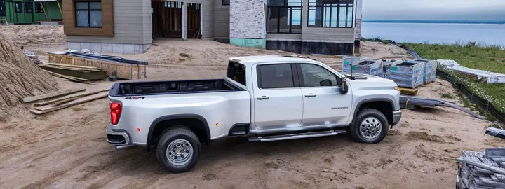 Chevrolet Silverado 2500 HD work truck at a residential construction site