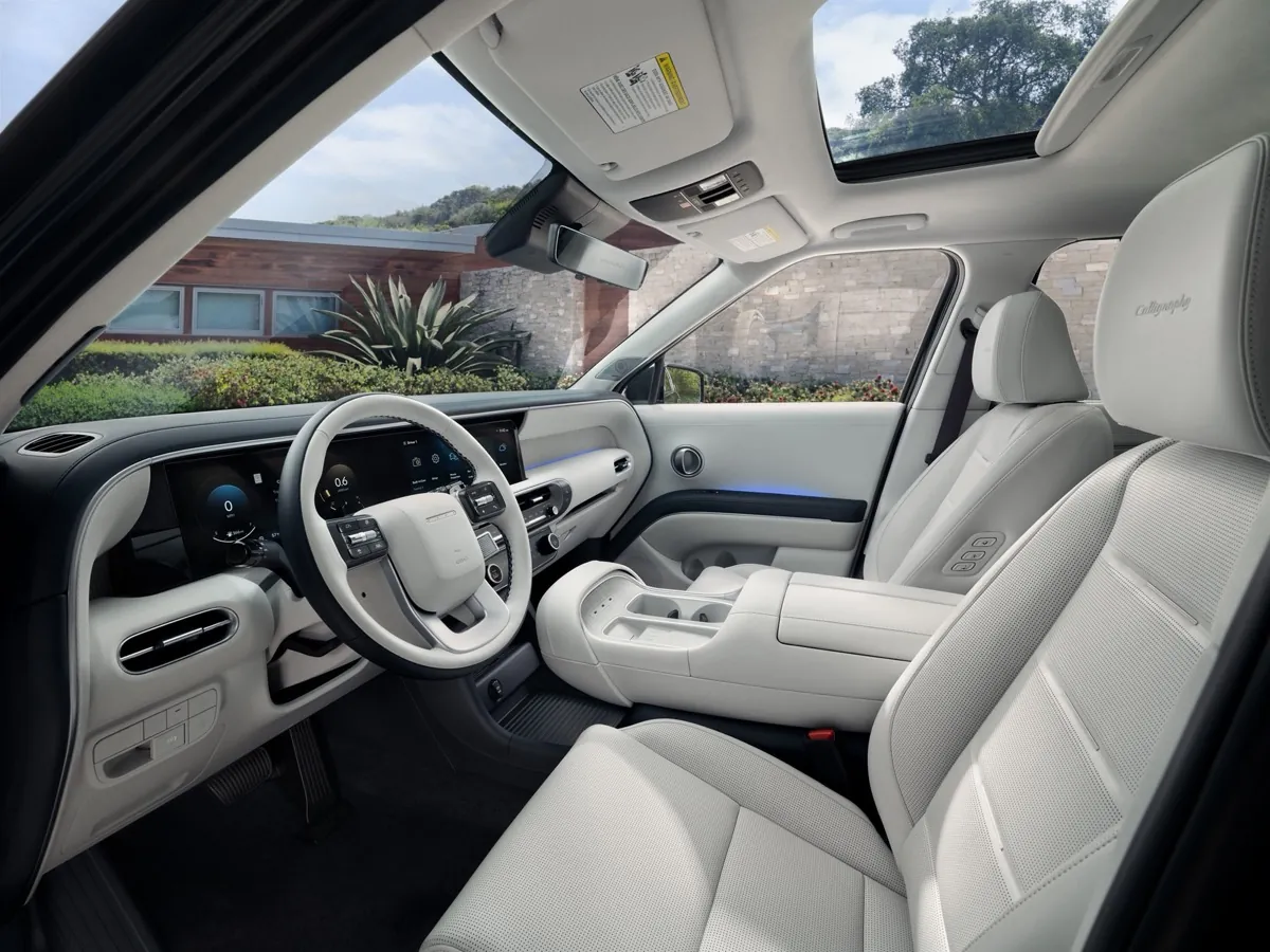 Light gray front seats and dashboard of a 2027 Hyundai Palisade